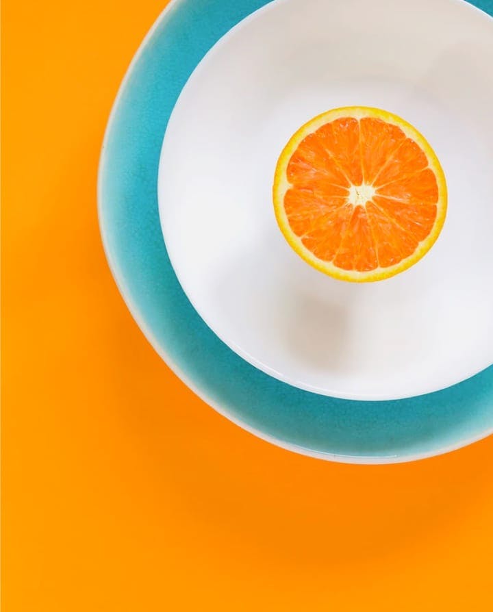 white egg on with a orange background